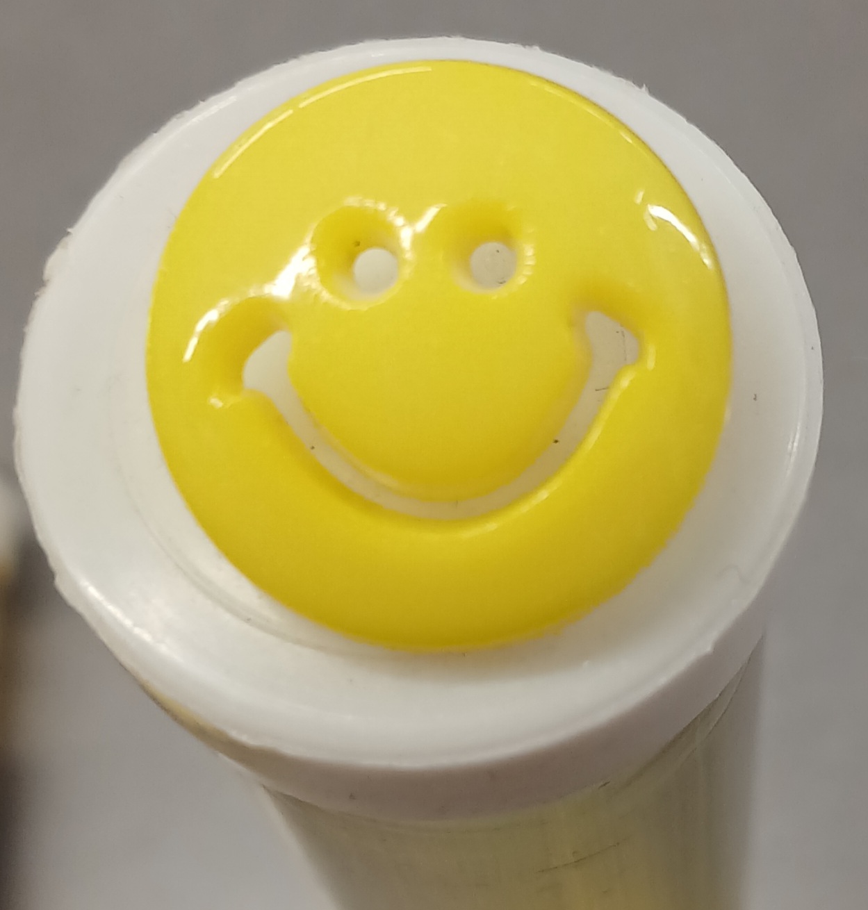 Smiley face shank button